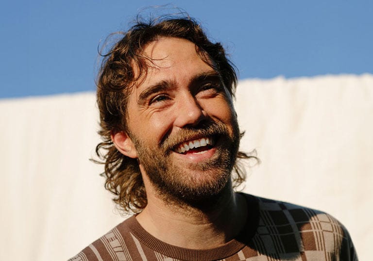 Portrait of Matt Corby outside in the sunshine