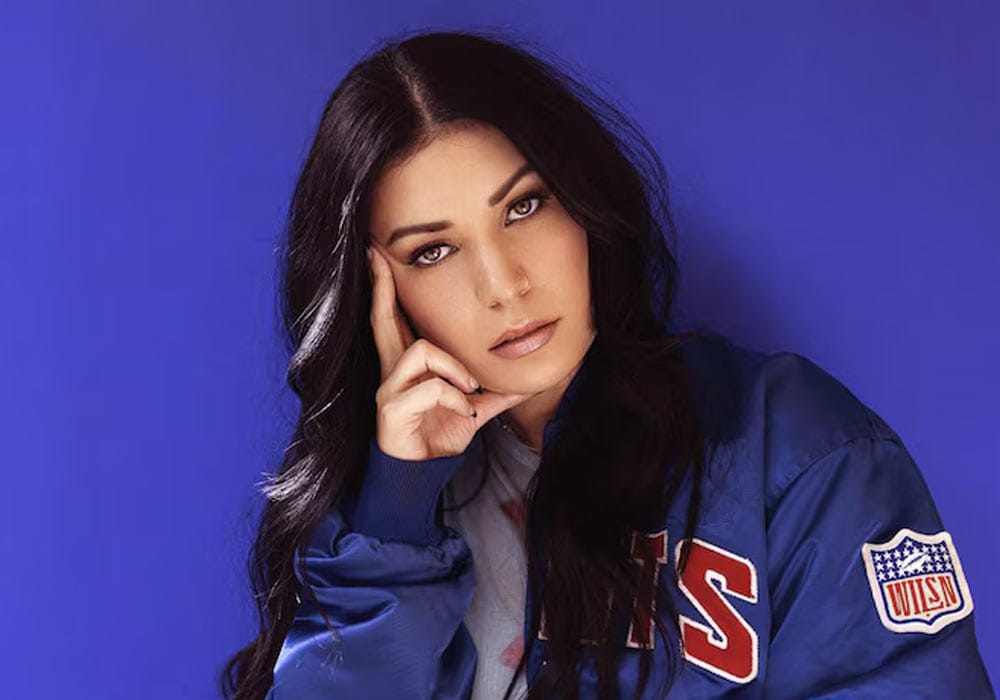 Wilsn portrait, wearing a Blue WILSN branded sports jacket